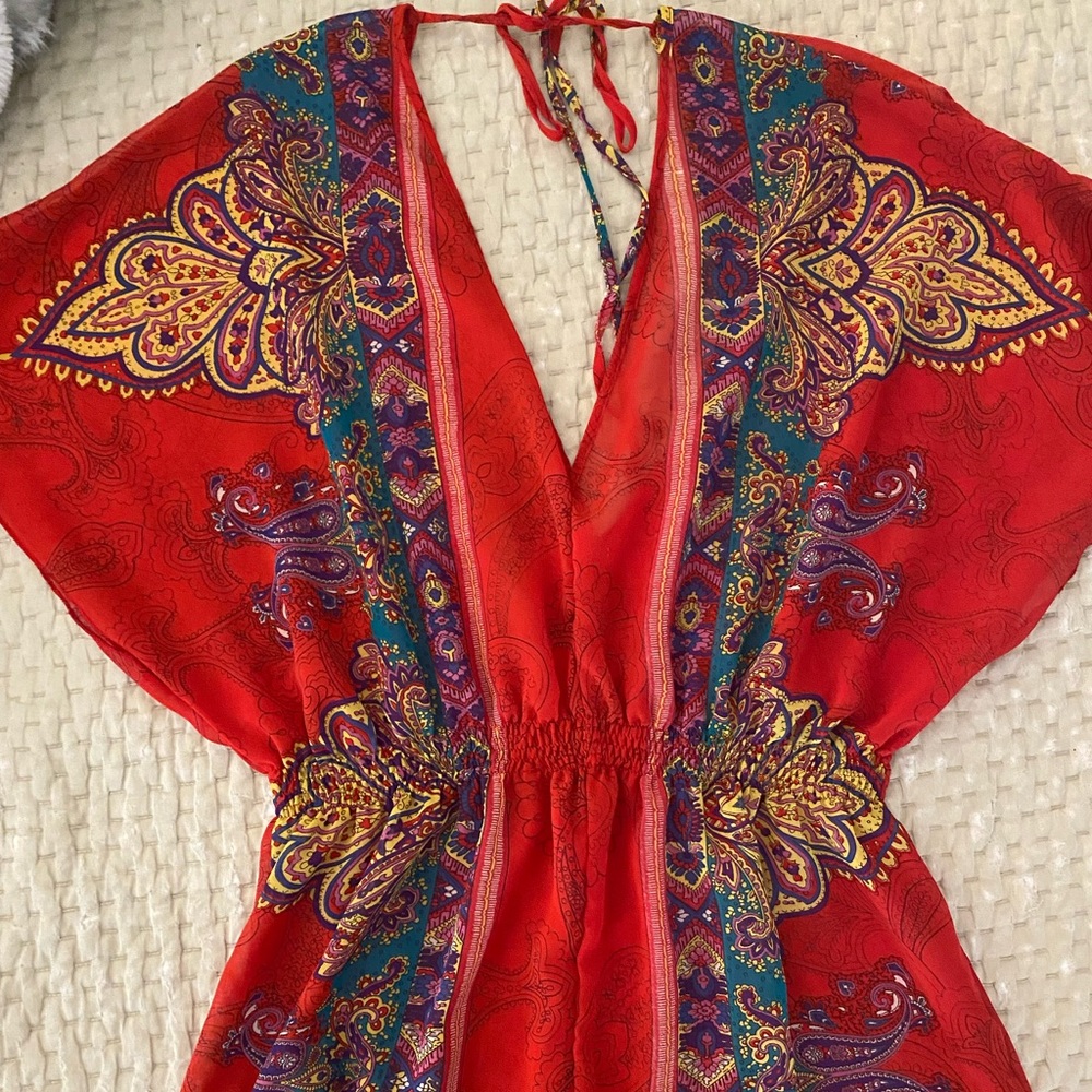 Sheer medium multi colored top.